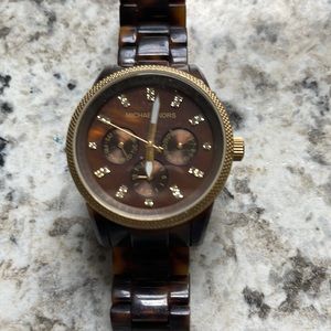 Michael Kors watch. Women’s. Brown. Gold trim.